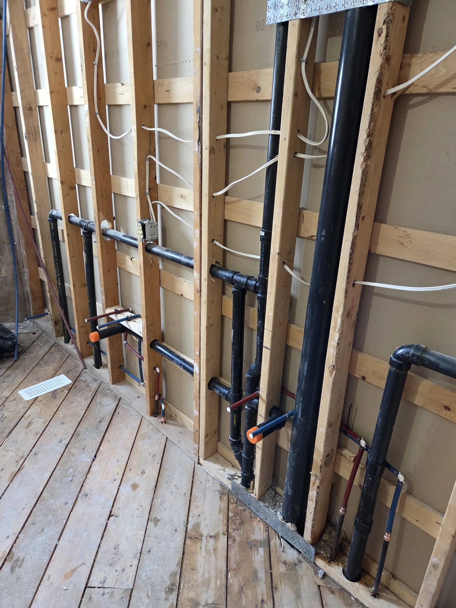 Shower valve with supply lines inside open wall framing